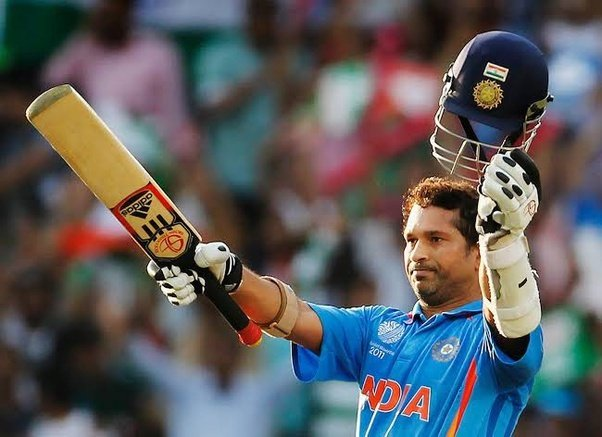 Sachin Tendulkar raising his bat and helmet | Most Centuries in Men's International Cricket